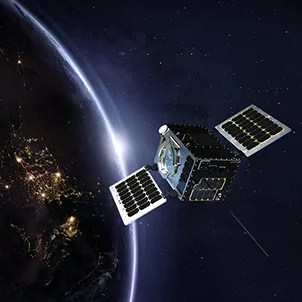 Satellite in space with Earth in the background