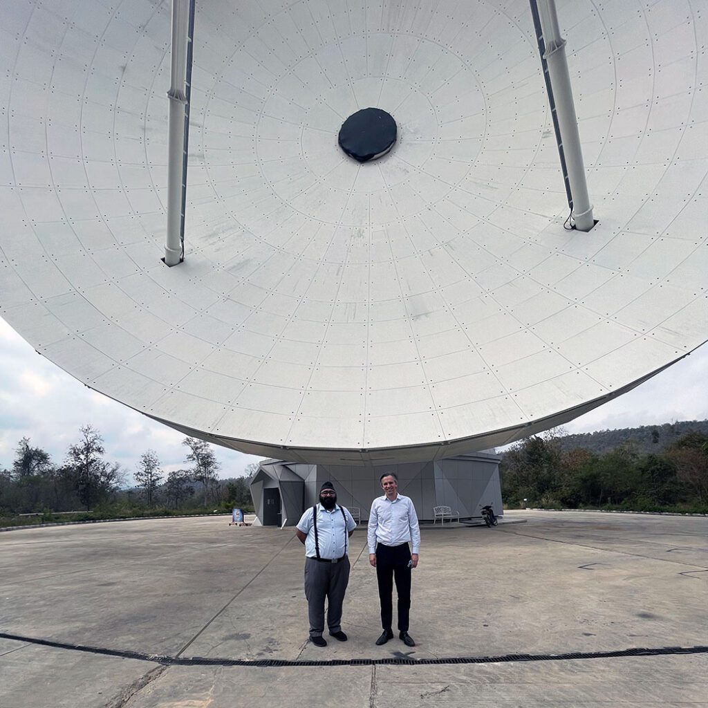 Ravit in front of an antenna